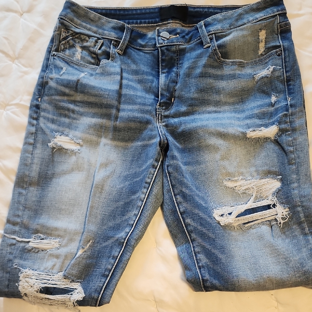Distressed Blue Jeans